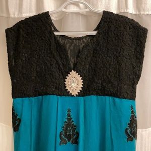Turquoise and black dress